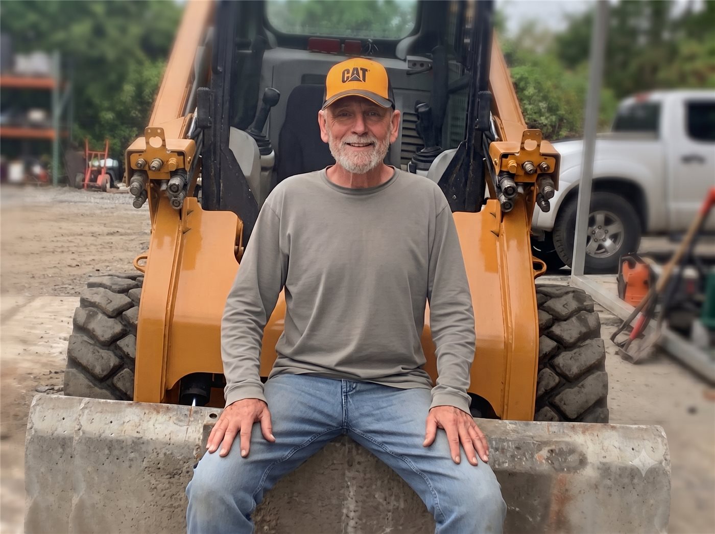 Stephen Milden on a CAT loader